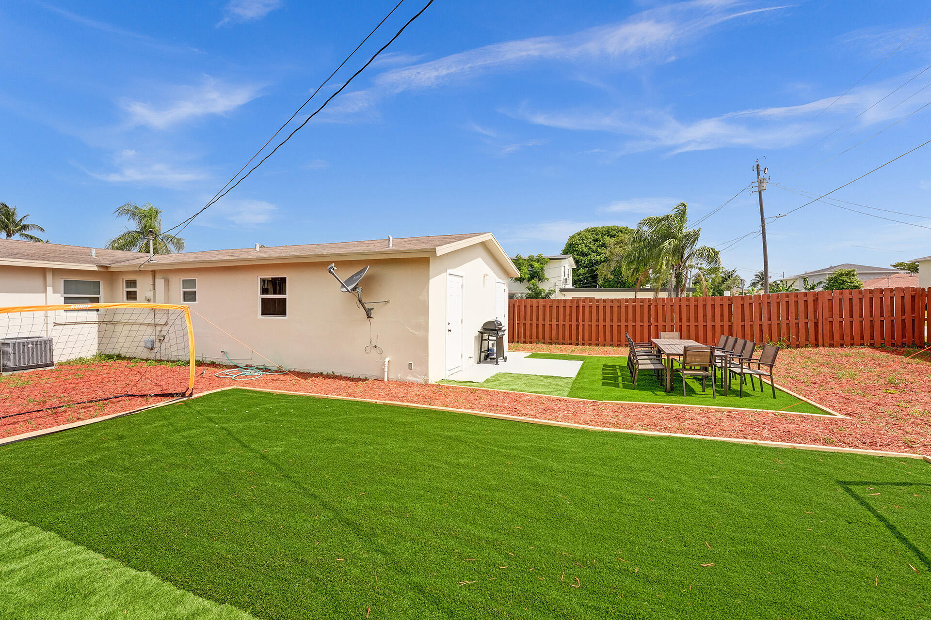 337 Southwest 8th Avenue Delray Beach, FL 33444 - Photo 48 of 48 a house view with a garden space