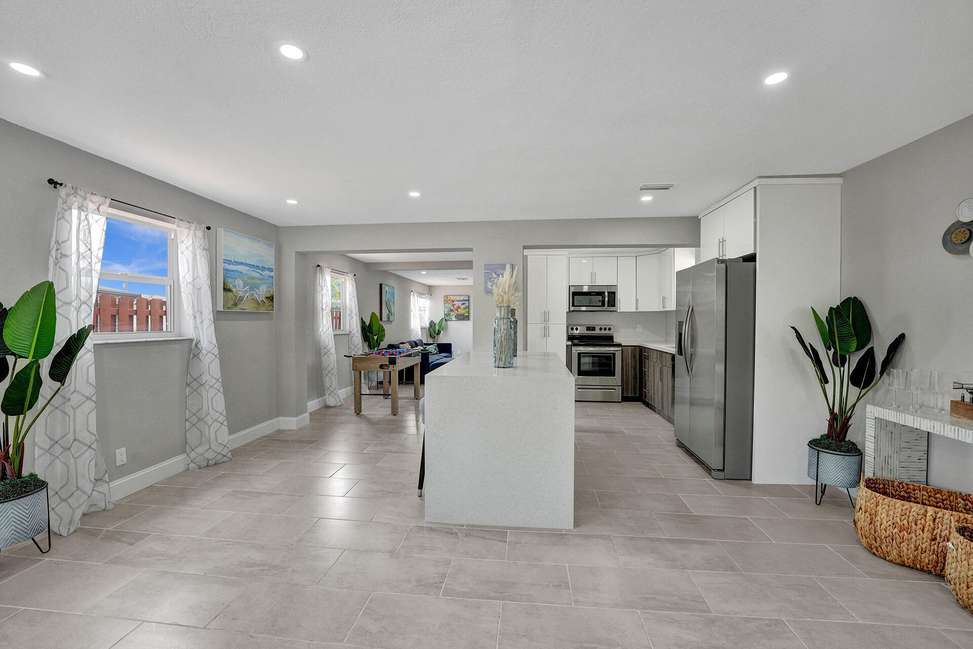 337 Southwest 8th Avenue Delray Beach, FL 33444 - Photo 5 of 48 a living room with furniture and a potted plant