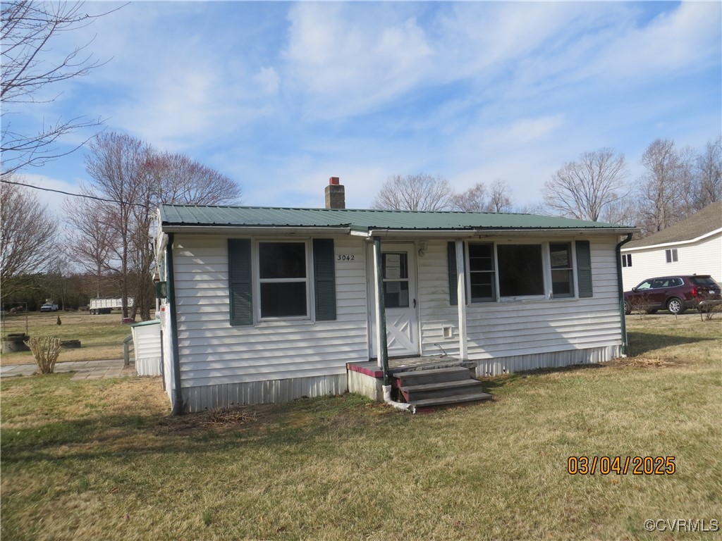 3042 Lara Road Lancaster, VA 22503 - Photo 1 of 15 a view of a house with a yard