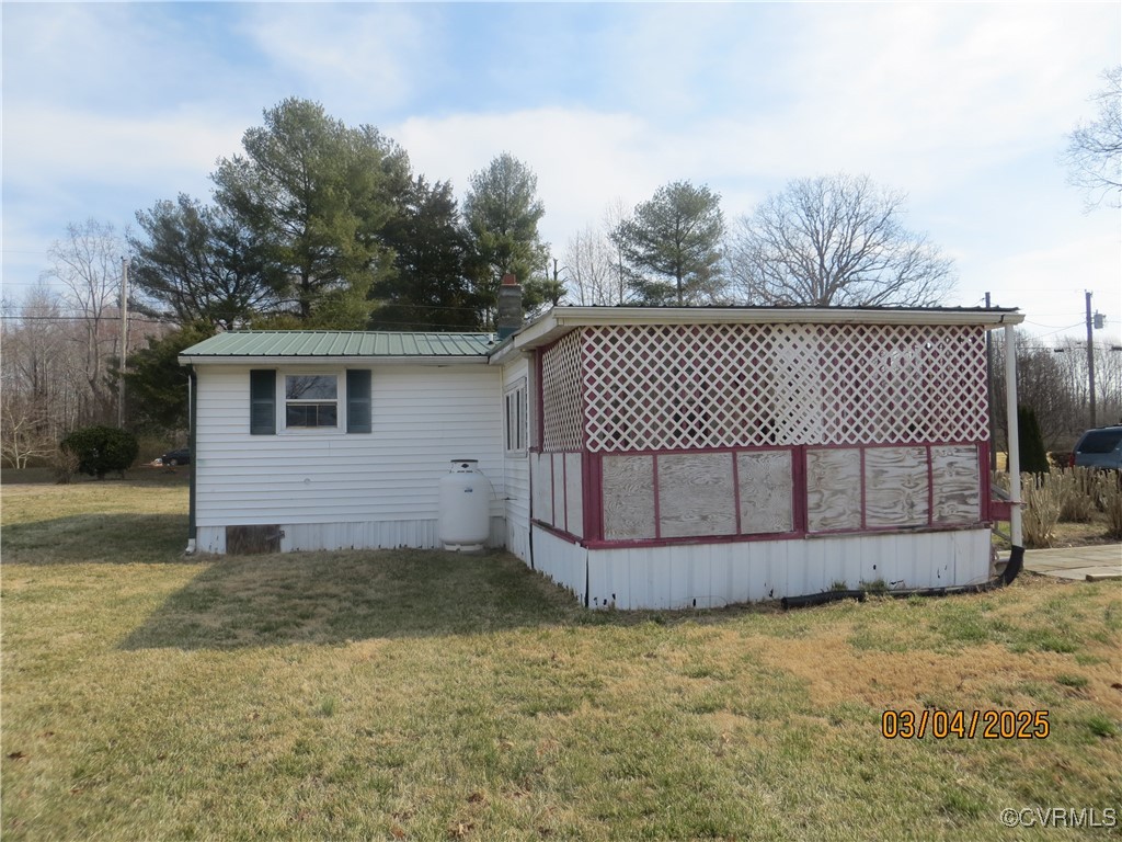 3042 Lara Road Lancaster, VA 22503 - Photo 2 of 15 a view of a small yard with wooden fence