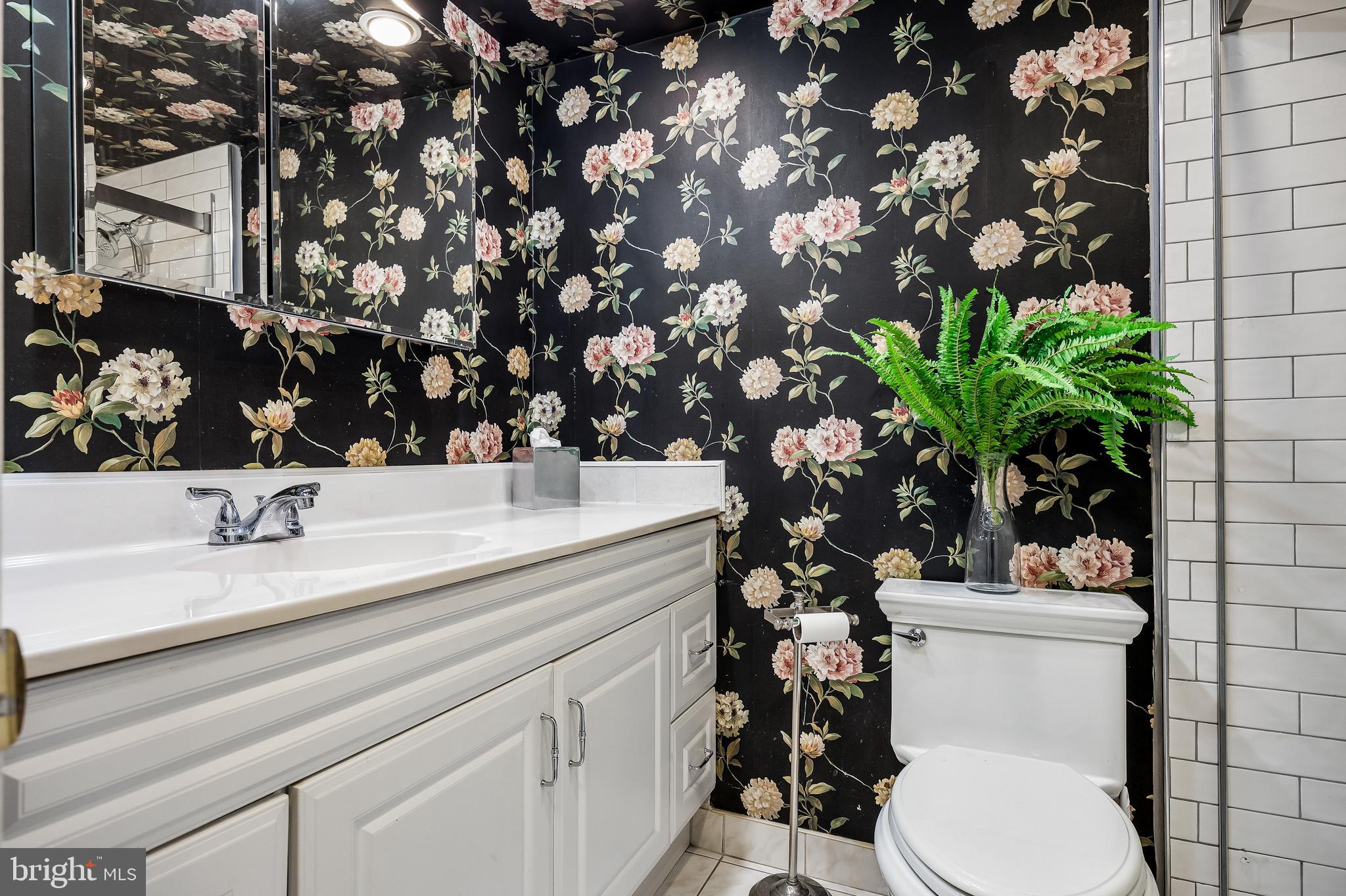 1840 Frontage Road, Unit 404 Cherry Hill, NJ 08034 - Photo 14 of 28 a bathroom with a toilet sink and mirror