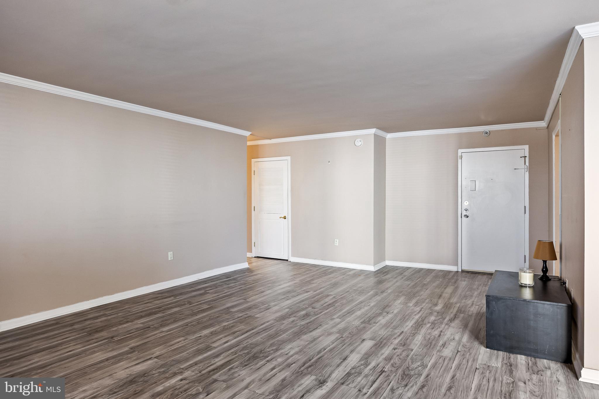 1840 Frontage Road, Unit 404 Cherry Hill, NJ 08034 - Photo 9 of 28 a view of an empty room with wooden floor