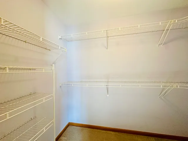 a view of a room with racks on the wall
