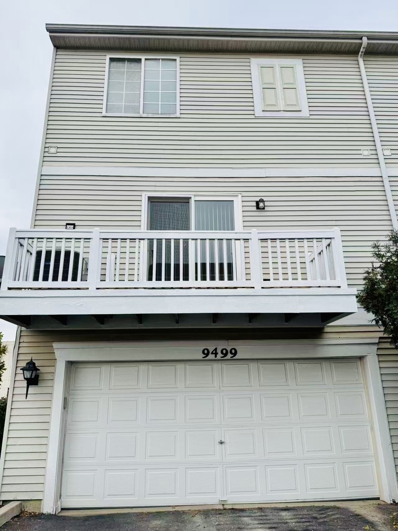 9499 Harrison Street, Unit 9499 Des Plaines, IL 60016 - Photo 3 of 17 a view of a house with porch