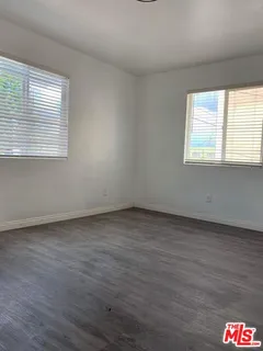 a kitchen with sink cabinets and window