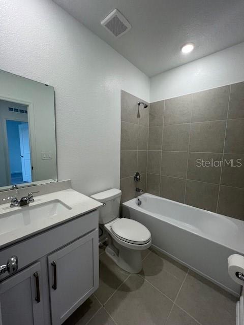 2691 Skyline Loop Kissimmee, FL 34758 - Photo 25 of 27 a bathroom with a sink a toilet and bathtub