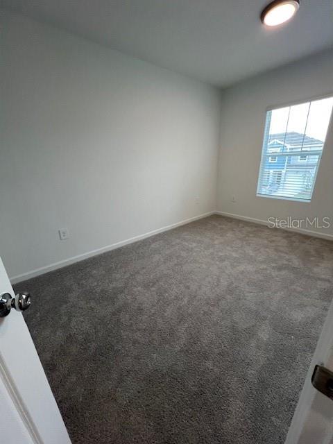2691 Skyline Loop Kissimmee, FL 34758 - Photo 27 of 27 a view of an empty room and window