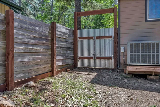 a view of a backyard with a chair