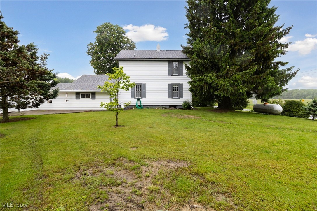 2860 Middle Road Pierpont, OH 44082 - Photo 29 of 50 Back of property featuring a lawn