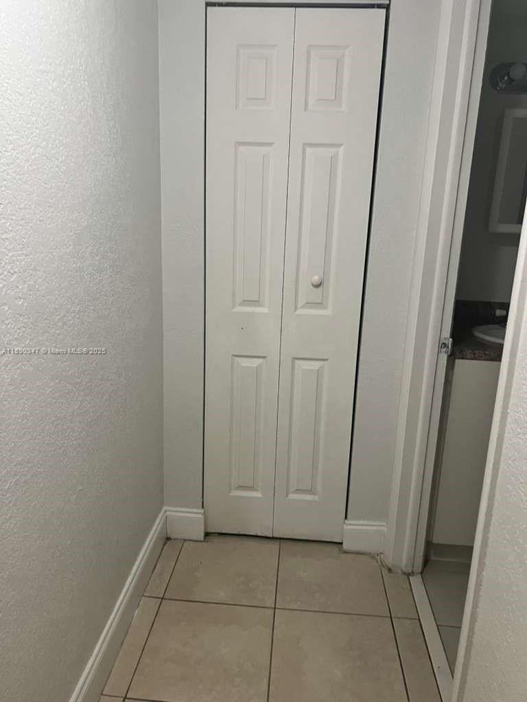 1875 West 56th Street, Unit 103 Hialeah, FL 33012 - Photo 13 of 13 a view of an empty room