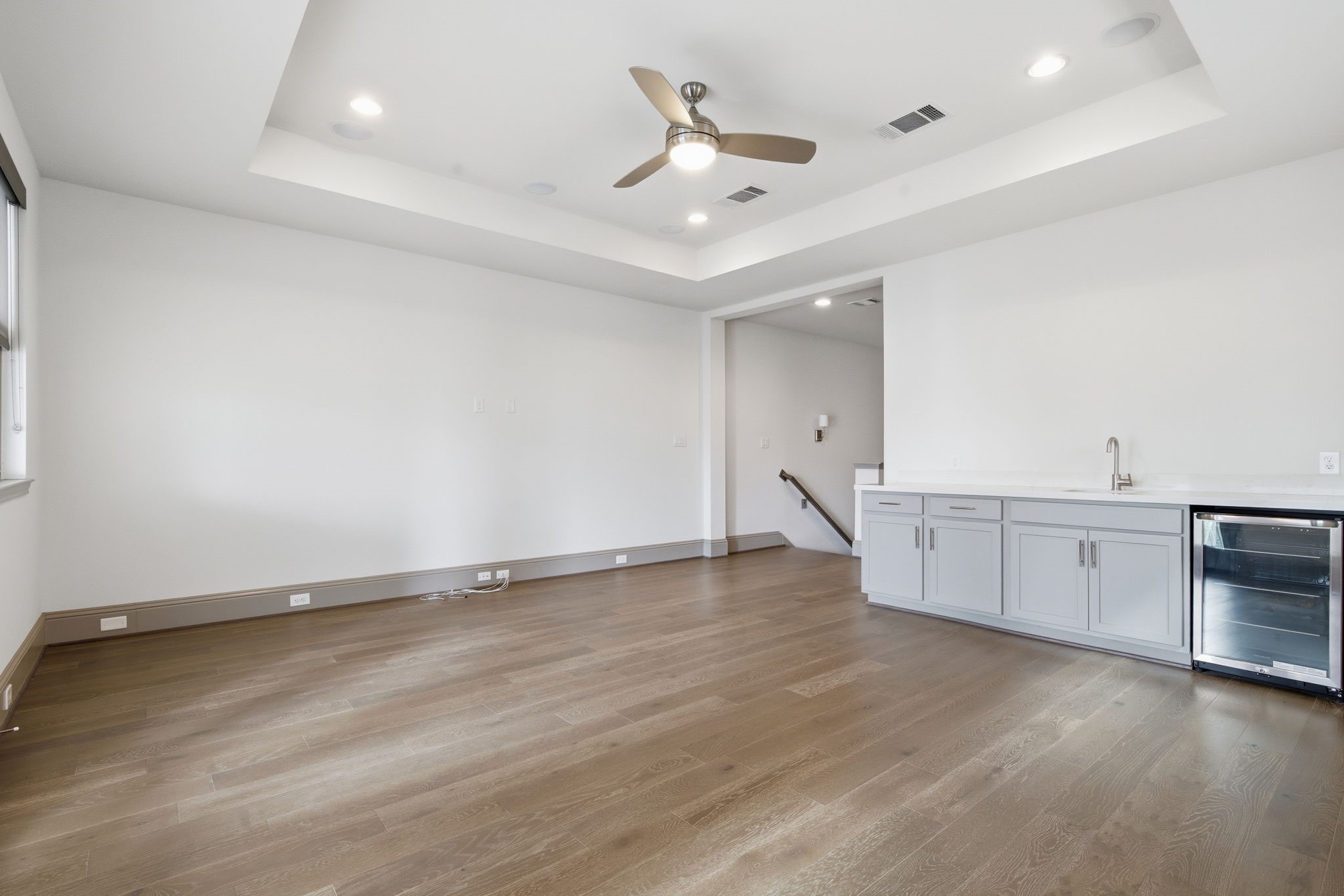1906 West 25th Street Houston, TX 77008 - Photo 30 of 47 Amazing entertainment/media room on the third floor, with balcony. Complete with sink, and mini fridge. Ultimate entertainment spot