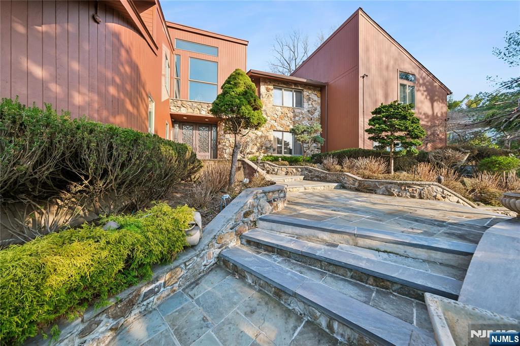 93 Jackson Drive Cresskill, NJ 07626 - Photo 1 of 37 a view of backyard with patio