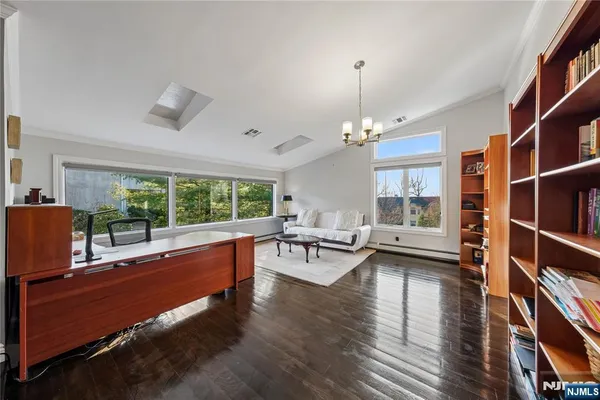 a view of backyard with outdoor seating a patio and plants