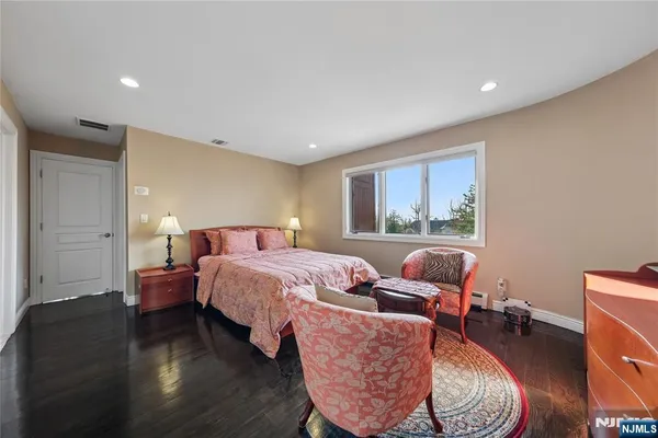 a view of a street with a building in the background