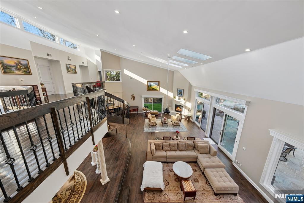 93 Jackson Drive Cresskill, NJ 07626 - Photo 27 of 37 a living room with lots of furniture and wooden floor