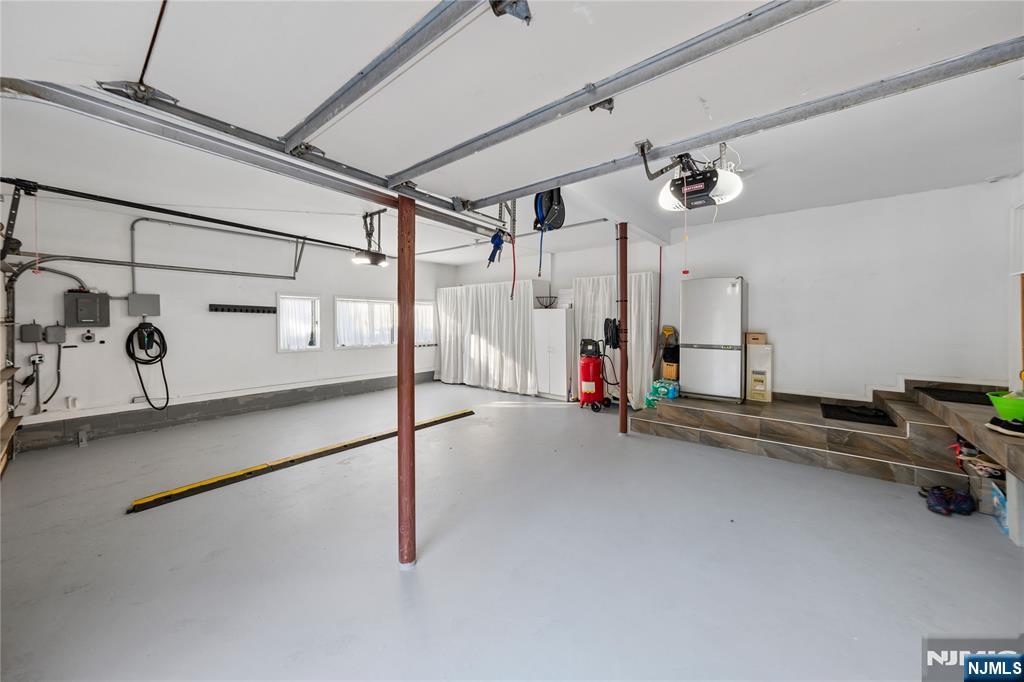 93 Jackson Drive Cresskill, NJ 07626 - Photo 29 of 37 a view of a garage with rack