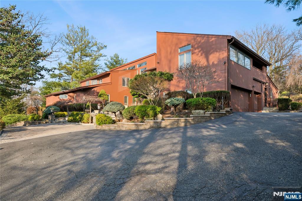 93 Jackson Drive Cresskill, NJ 07626 - Photo 35 of 37 a view of a street with a building in the background