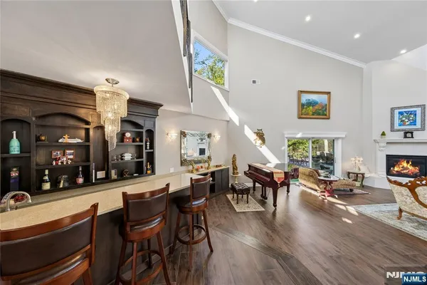 a bathroom with a sink mirror and toilet