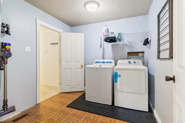 a storage room with washer and dryer