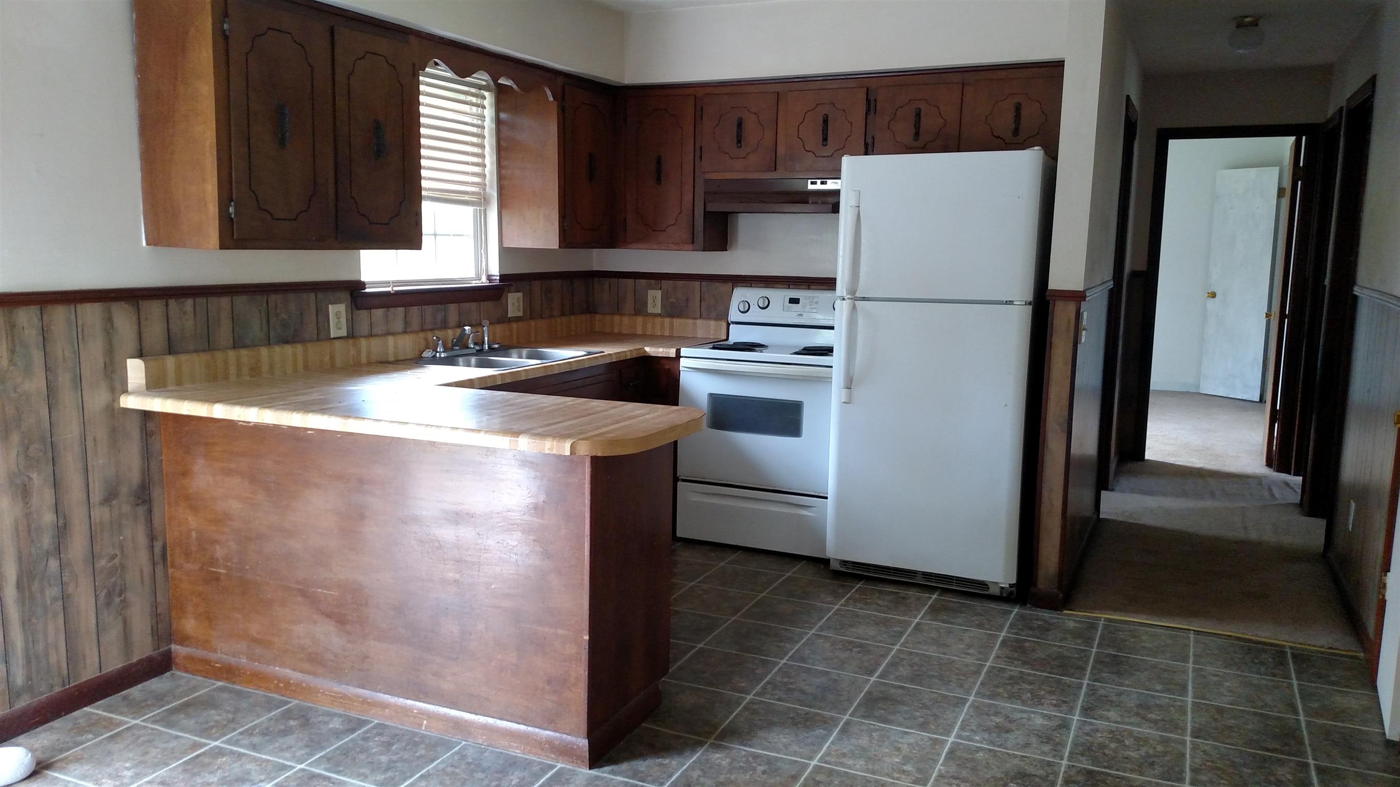 1776 Stacey Road Smithville, TN 37166 - Photo 5 of 7 stove and refrigerator stay with property