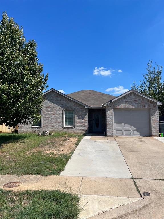 a house view with a garden space