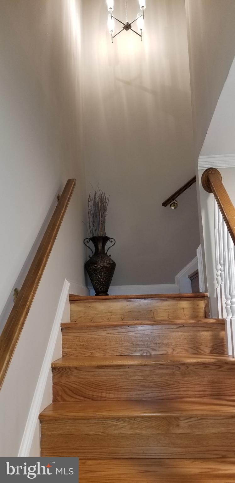 7700 Falstaff Road McLean, VA 22102 - Photo 15 of 48 Foyer to upstairs