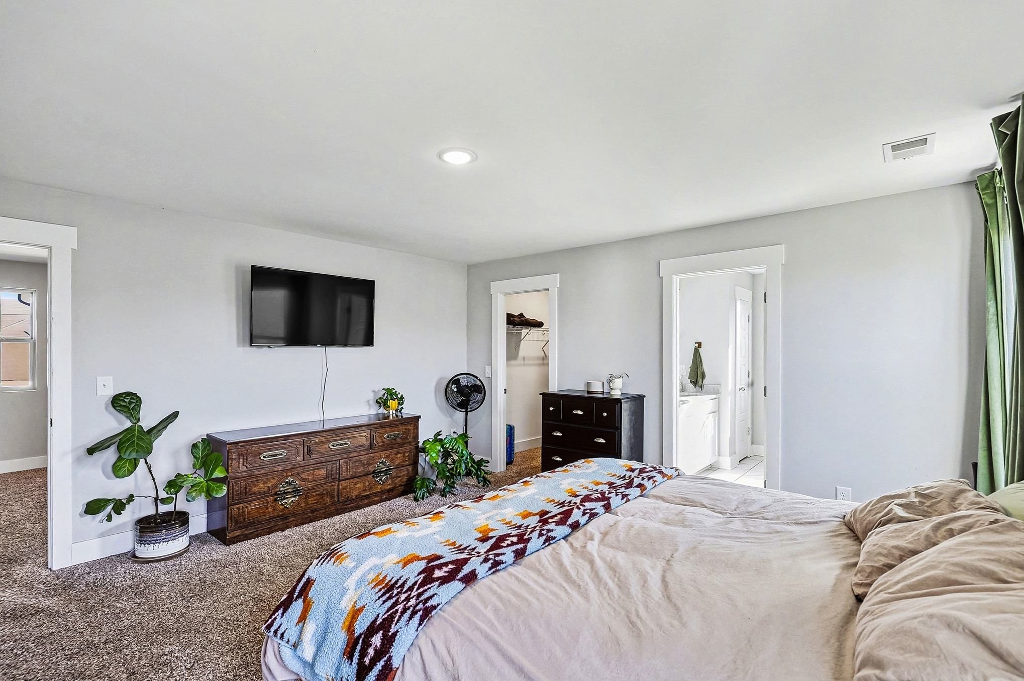 616 Bella Court Lebanon, TN 37087 - Photo 15 of 32 a bedroom with a bed and a flat screen tv