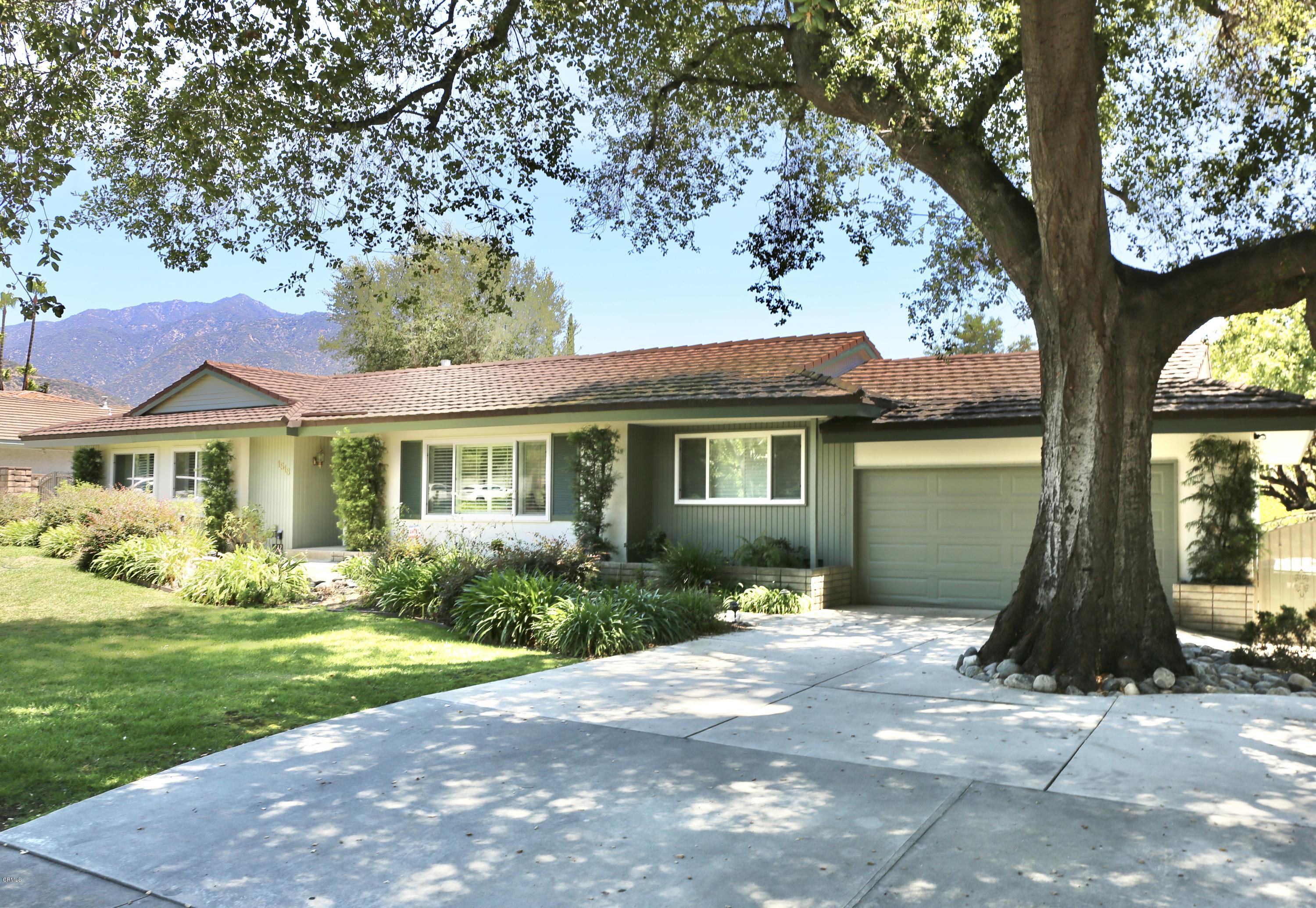 1518 Rodeo Road Arcadia, CA 91006 - Photo 1 of 30 a front view of a house with garden