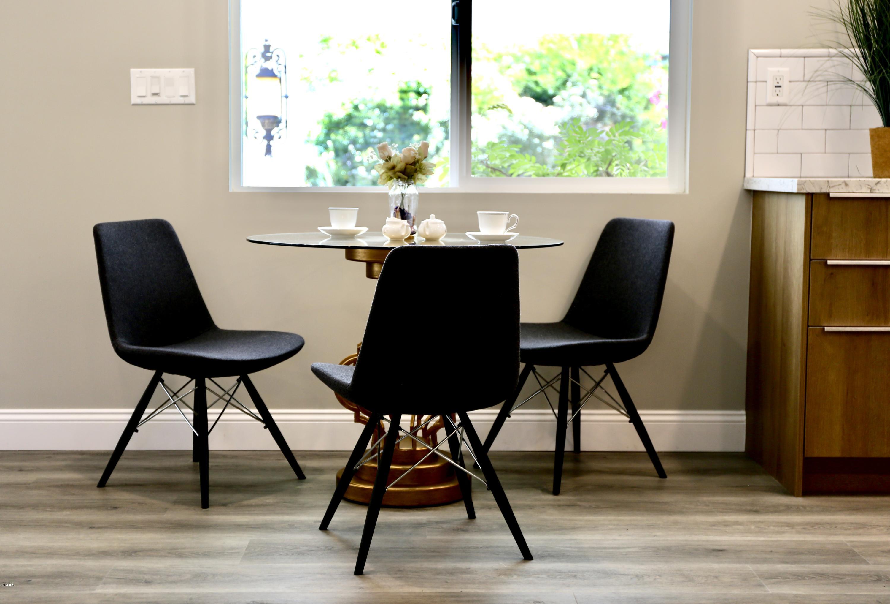 1518 Rodeo Road Arcadia, CA 91006 - Photo 11 of 30 a view of a dining room with furniture window and wooden floor