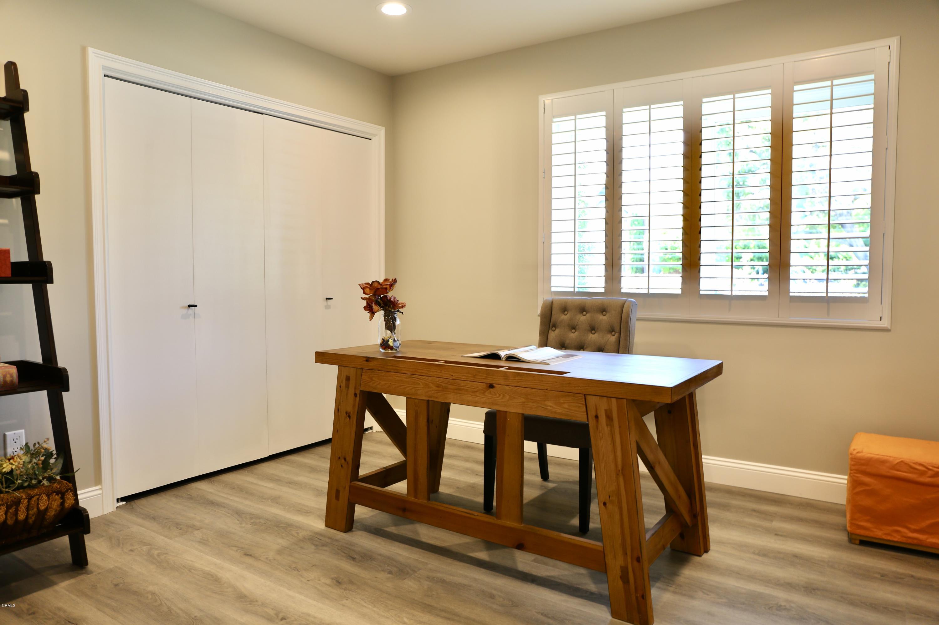 1518 Rodeo Road Arcadia, CA 91006 - Photo 17 of 30 a table and chairs in a room with a window