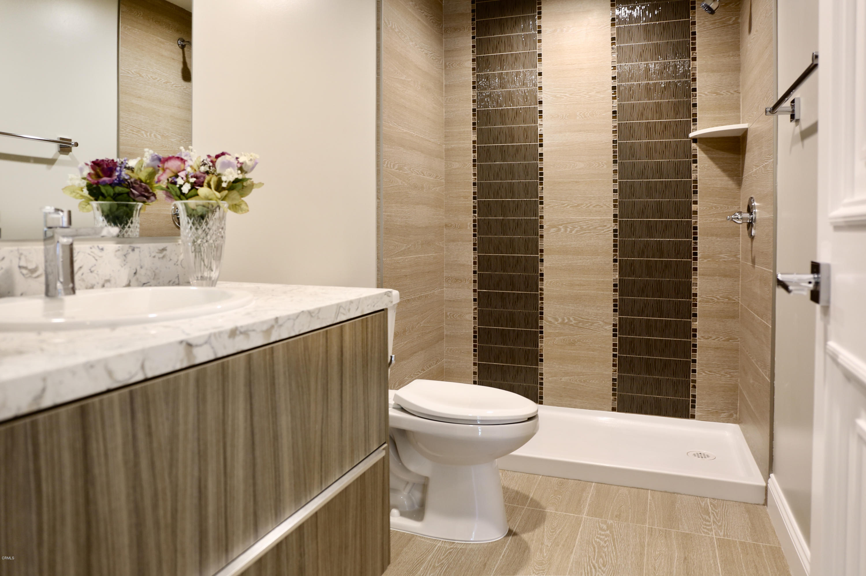 1518 Rodeo Road Arcadia, CA 91006 - Photo 18 of 30 a bathroom with a sink a toilet and shower