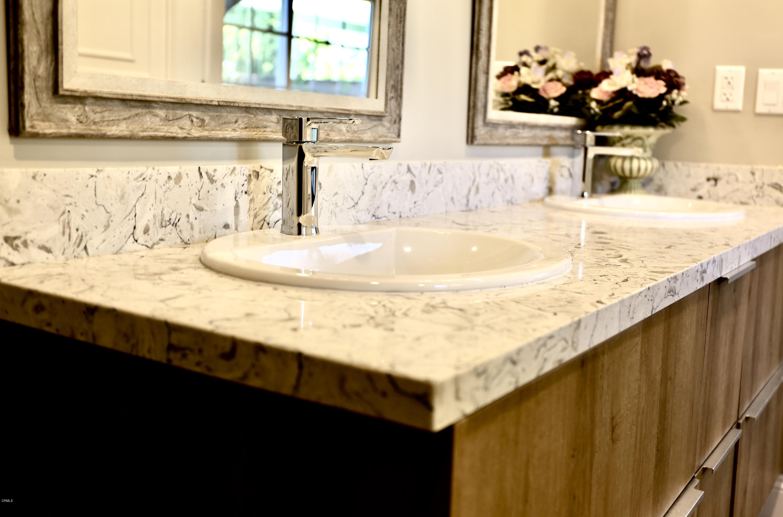 1518 Rodeo Road Arcadia, CA 91006 - Photo 25 of 30 a bathroom with a sink and a mirror