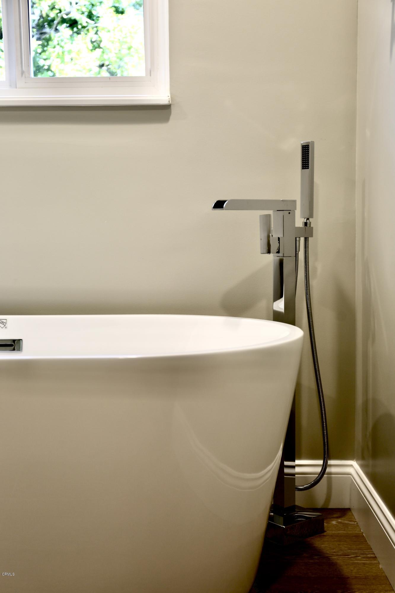 1518 Rodeo Road Arcadia, CA 91006 - Photo 26 of 30 a bathroom with a bathtub