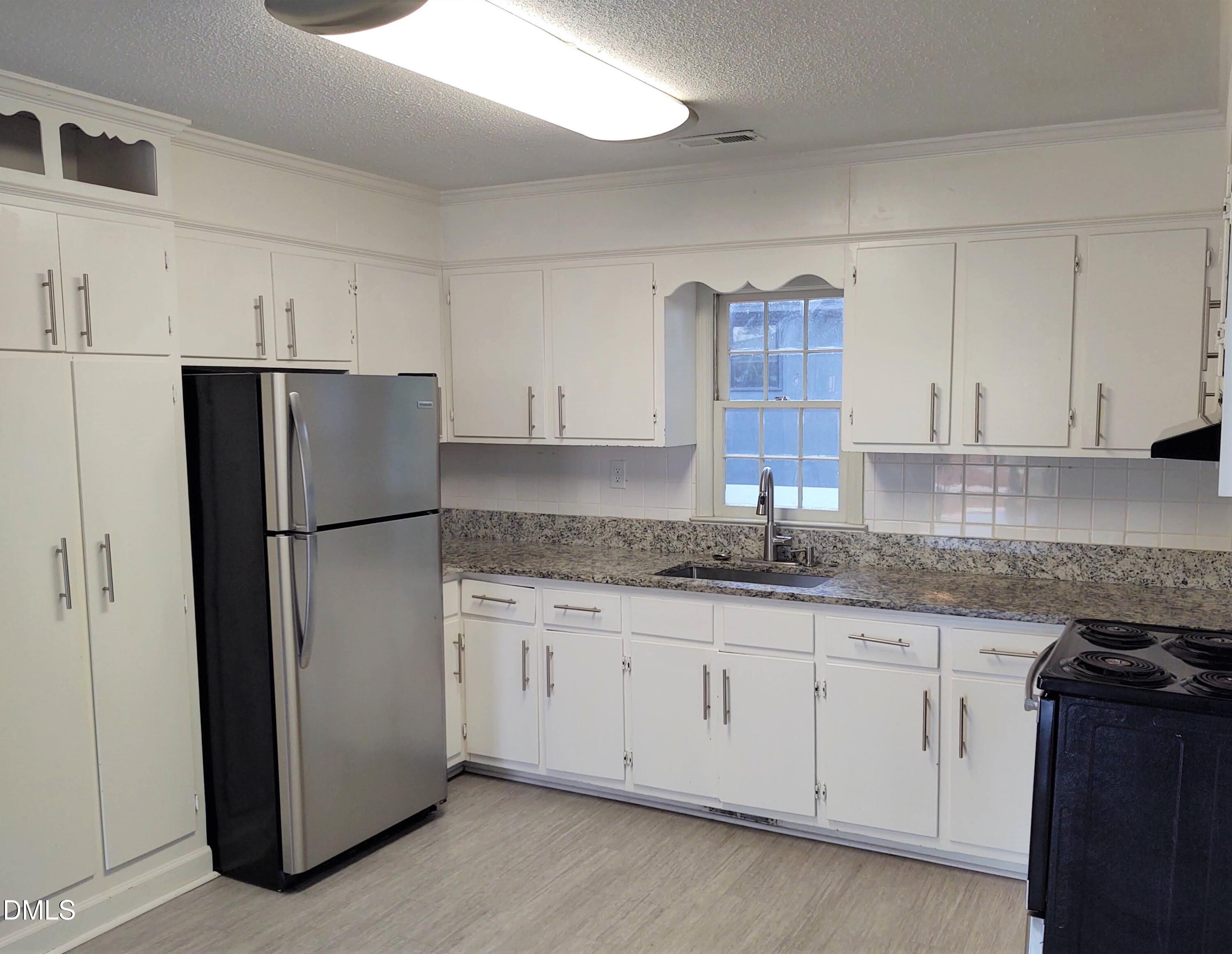 15 North Fisher Street, Unit B Raleigh, NC 27610 - Photo 5 of 10 2022 Kit-1