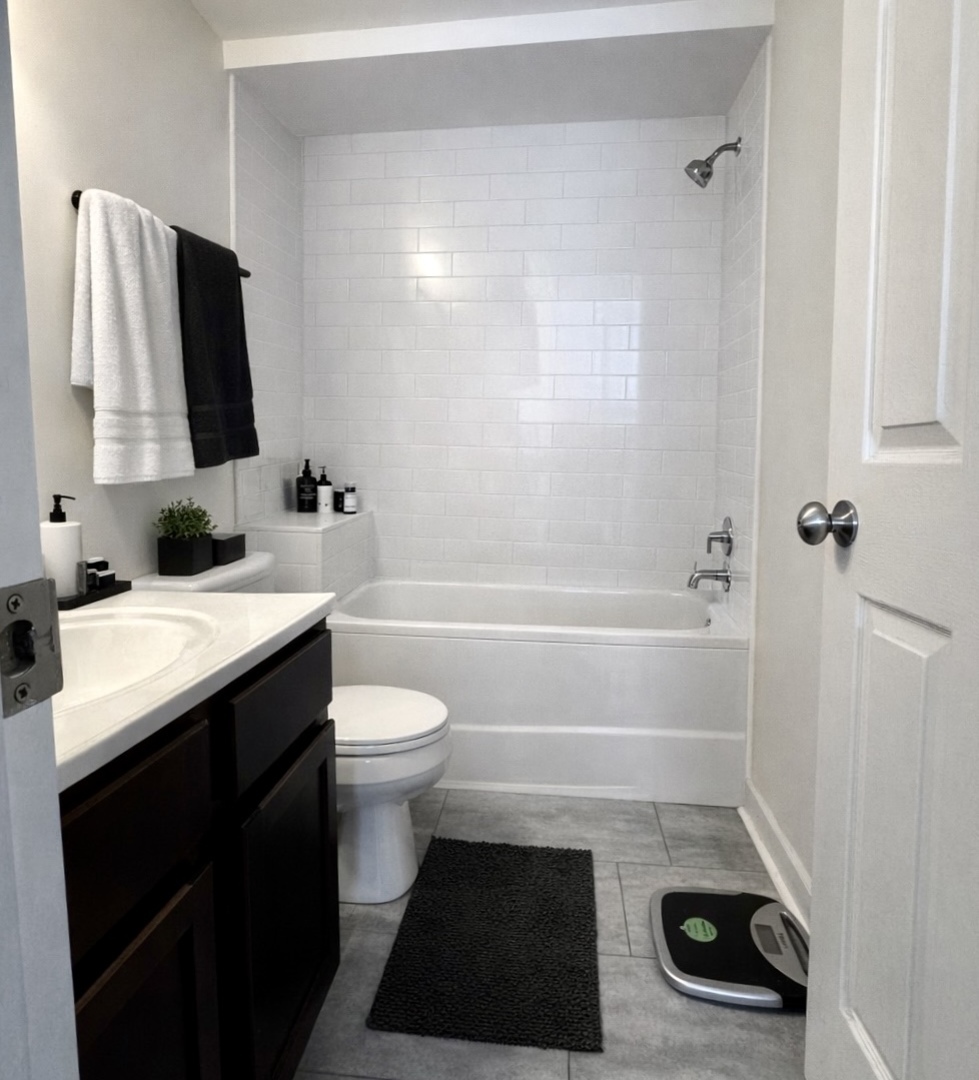 2300 Old Tavern Road, Unit 205 Lisle, IL 60532 - Photo 11 of 12 a bathroom with a sink a toilet and shower