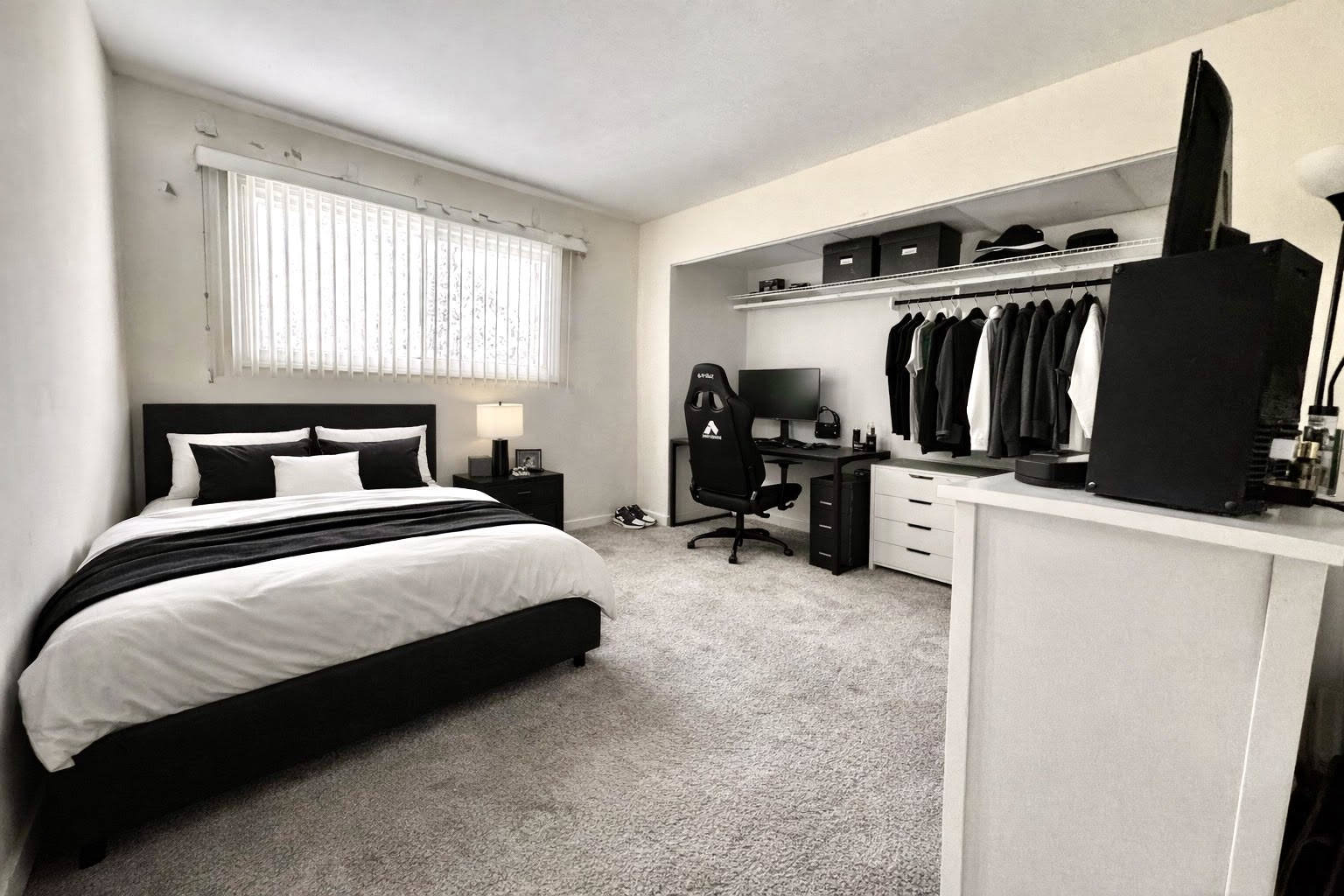 2300 Old Tavern Road, Unit 205 Lisle, IL 60532 - Photo 9 of 12 a bedroom with a bed and a walk in closet