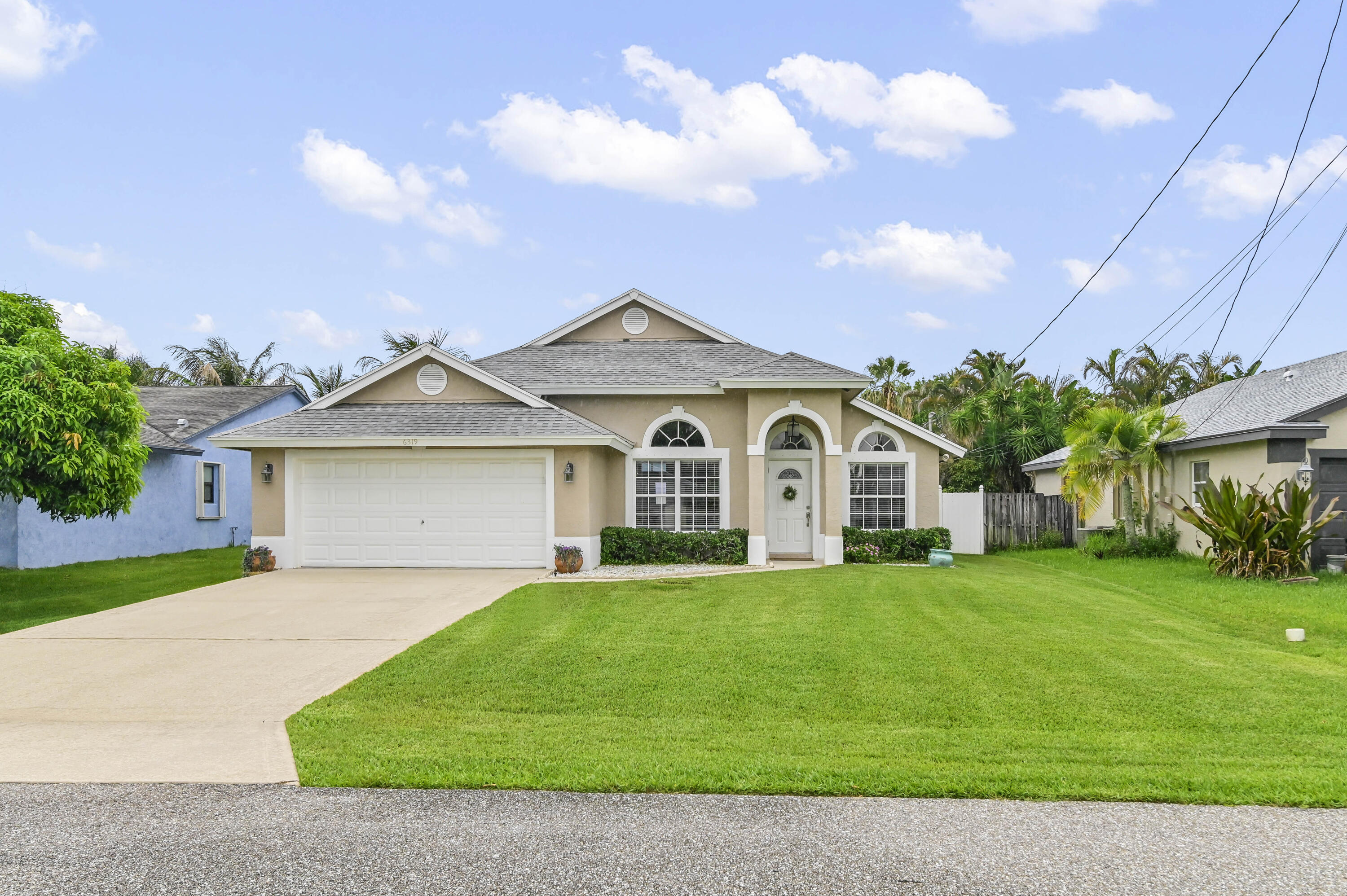 6319 Foster Street Jupiter, FL 33458 - Photo 21 of 24 01 Front 01
