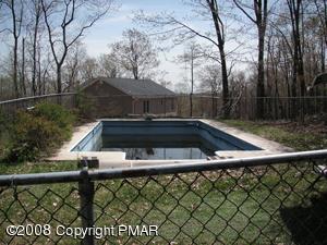 33 Old Timber Road Mount Pocono, PA 18344 - Photo 6 of 14 a view of swimming pool and trees in the background