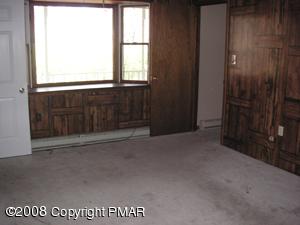33 Old Timber Road Mount Pocono, PA 18344 - Photo 9 of 14 an empty room with a window