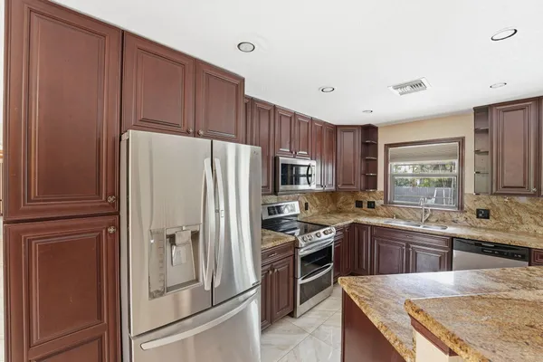 $6,000 | 12356 61st Lane North, West Palm Beach, FL 33412