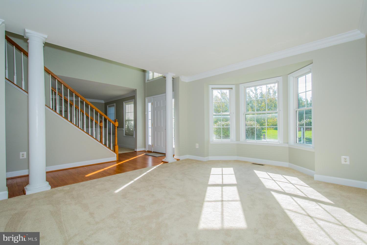 5986 Calvert Way Eldersburg, MD 21784 - Photo 14 of 40 a view of an empty room with windows