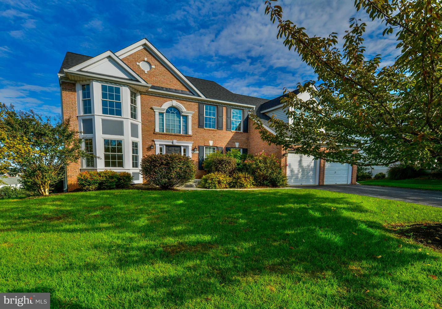 5986 Calvert Way Eldersburg, MD 21784 - Photo 40 of 40 a front view of a house with a garden