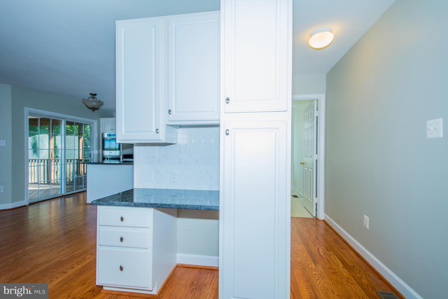 5986 Calvert Way Eldersburg, MD 21784 - Photo 10 of 40 a view of kitchen with wooden floor