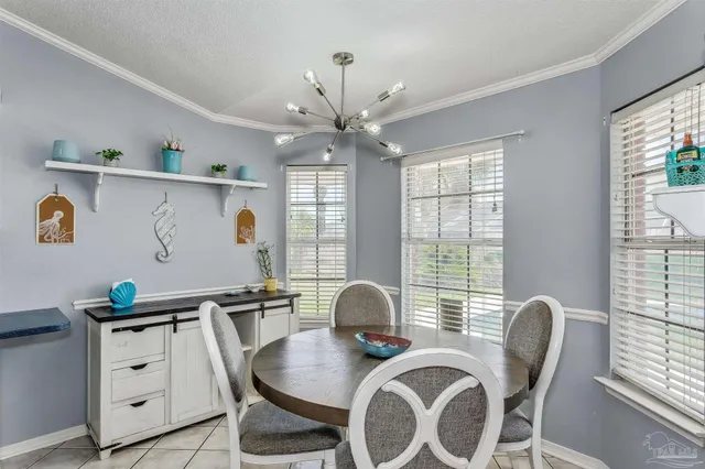 a workspace with furniture and window