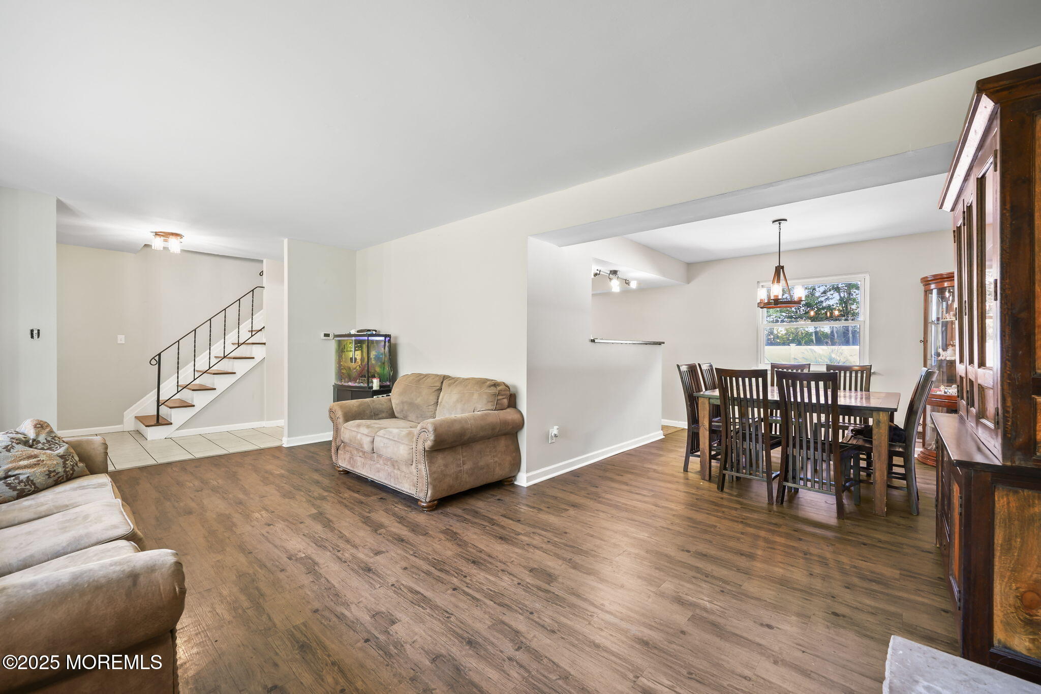 99 Glenarden Drive Howell, NJ 07731 - Photo 11 of 37 a living room with furniture and a wooden floor