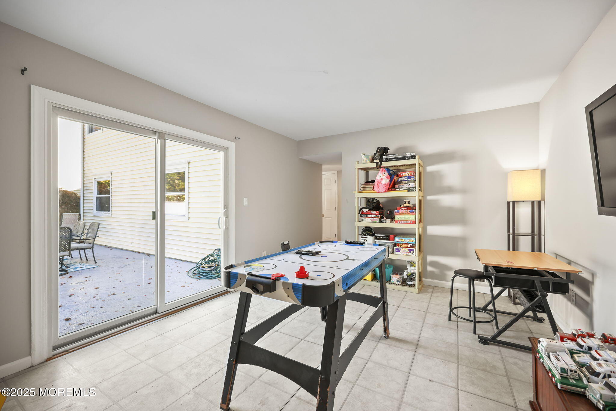 99 Glenarden Drive Howell, NJ 07731 - Photo 19 of 37 a view of a workspace with furniture and a window