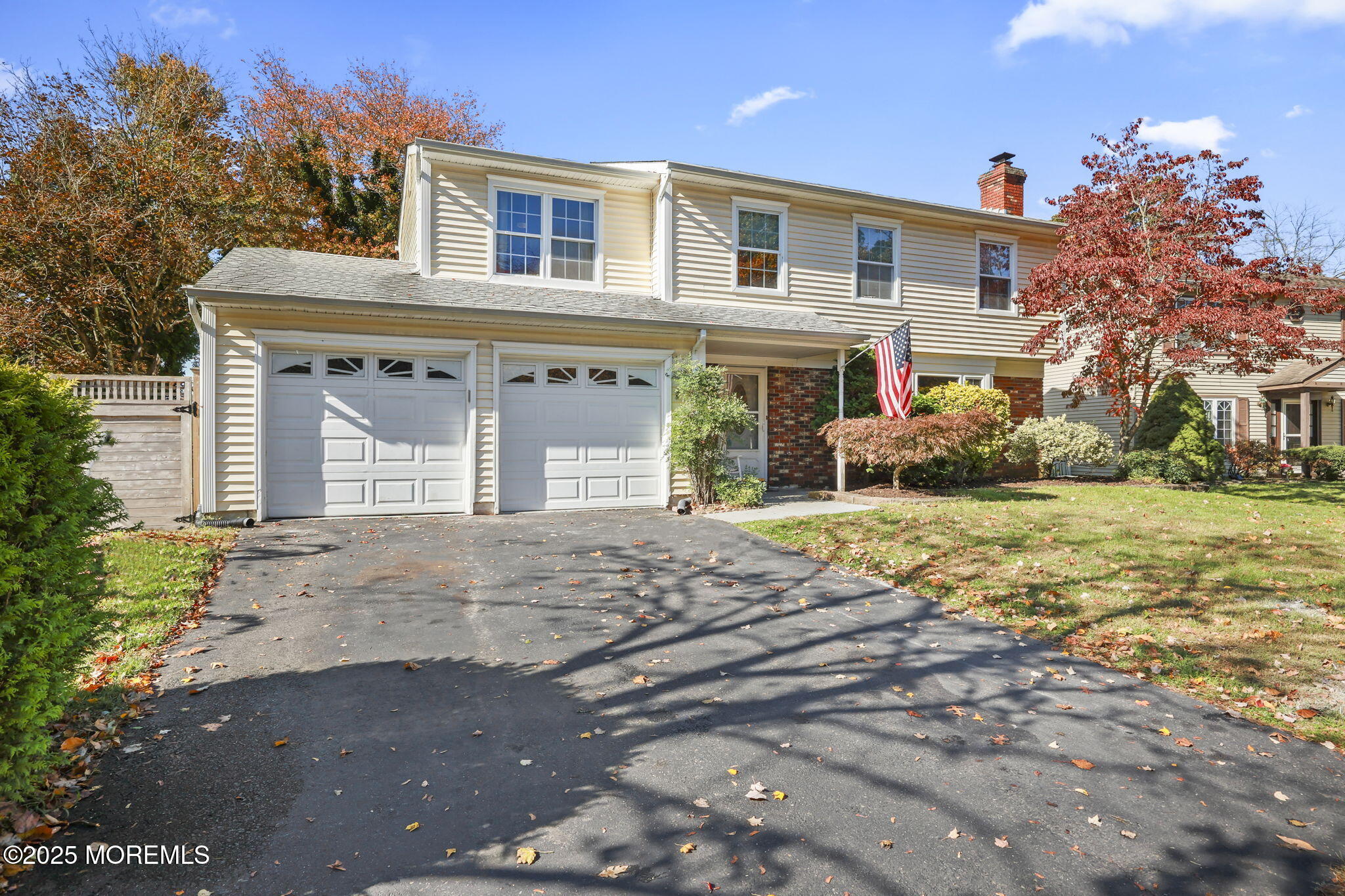 99 Glenarden Drive Howell, NJ 07731 - Photo 2 of 37 a front view of a house with a yard