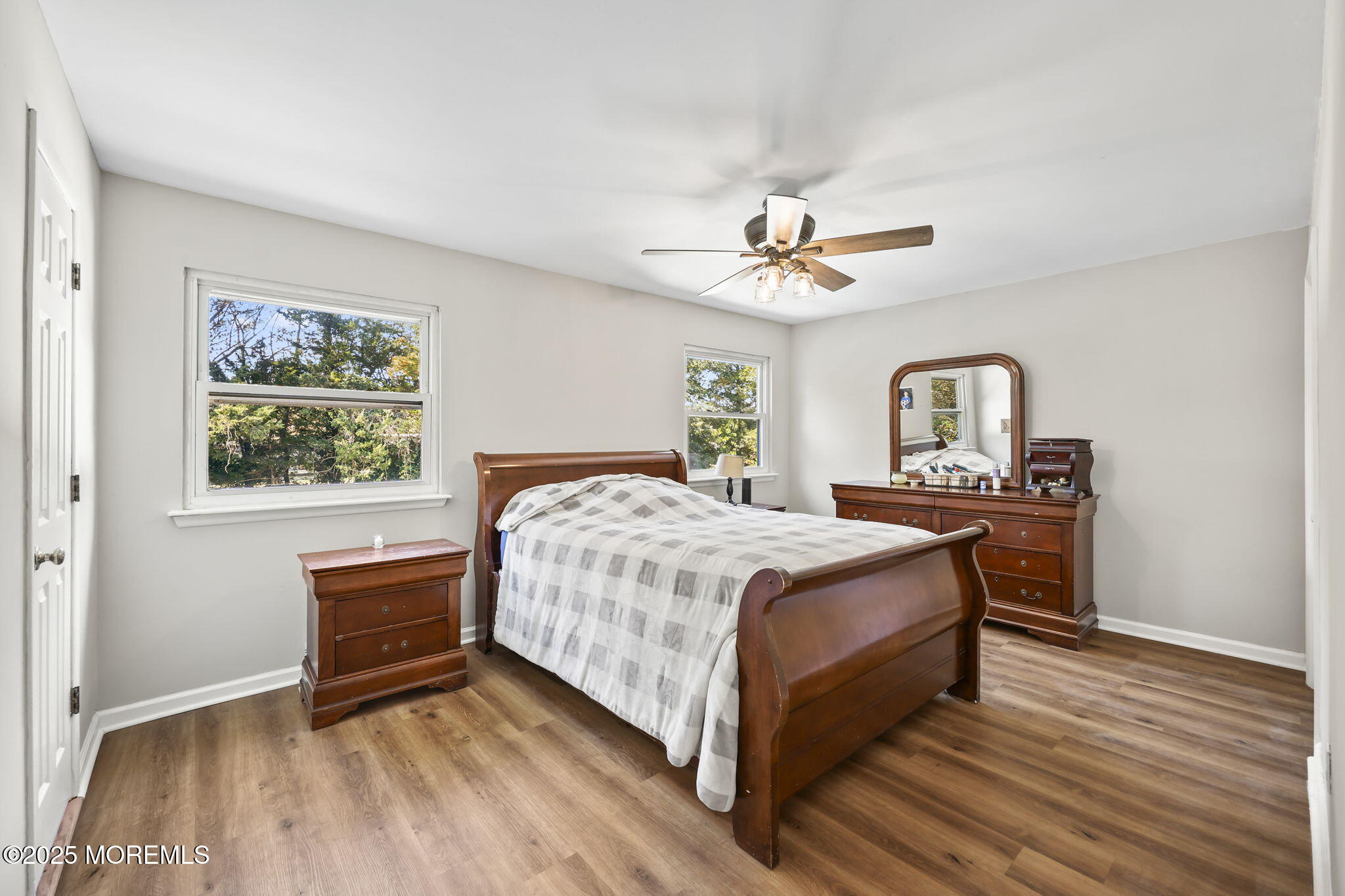 99 Glenarden Drive Howell, NJ 07731 - Photo 27 of 37 a bedroom with a bed and a window