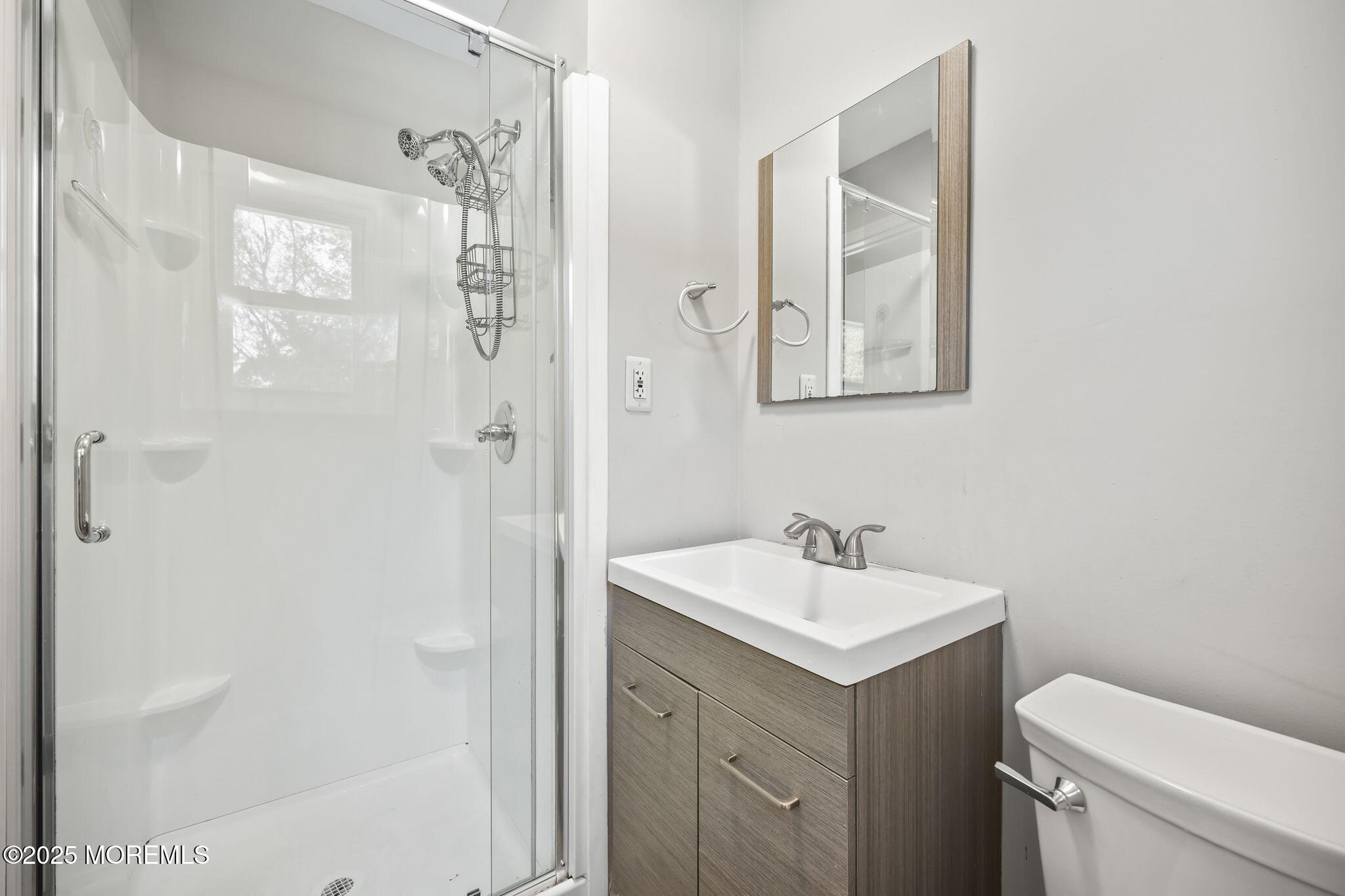 99 Glenarden Drive Howell, NJ 07731 - Photo 30 of 37 a bathroom with a sink toilet and shower