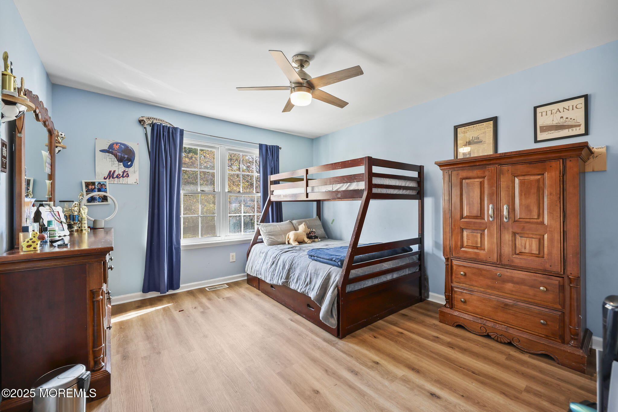 99 Glenarden Drive Howell, NJ 07731 - Photo 31 of 37 a bedroom with a bed and wooden floor